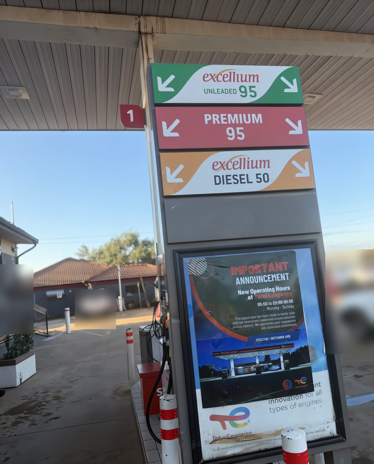 Pump island 1 with signs for Excellium Unleaded 95, Premium 95 and Excellium Diesel 50